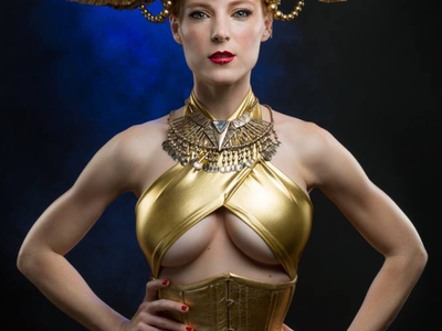 Castle Corsetry created this gold leather corset for Jessica Dru for her fantasy photo shoot with Zack Podratz.	